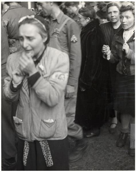 German Women Are Forced To View The Atrocities Committed At The Woebbelin Concentration Camp