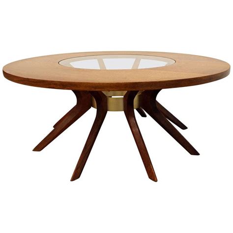 The piece features a single small drawer for convenient storage of essential living room items, while the open bottom shelf is great for display or keeping books and magazines out of the way. Mid-Century Modern Broyhill Brasilia Danish Modern Round ...