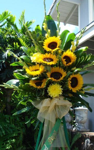A group of women that she worked with got together and named a star after the baby. Sunflowers | Funeral flowers, Sympathy flowers, Funeral sprays