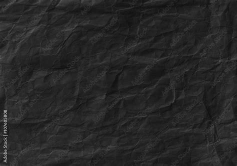 Black Crumpled Paper Texture Background And Wallpaper Stock Photo
