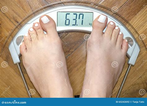 Feet On Scales Stock Photo Image Of Foot Feet Isolated 65242692