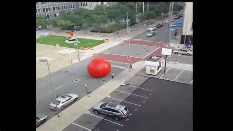 Giant Red Ball Rolling Down The Streets Youtube