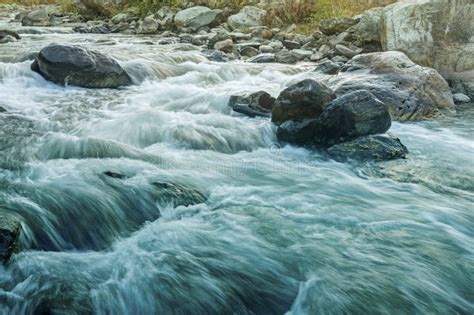 River Water Flowing Through Rocks At Dawn Stock Photo Image Of Liquid