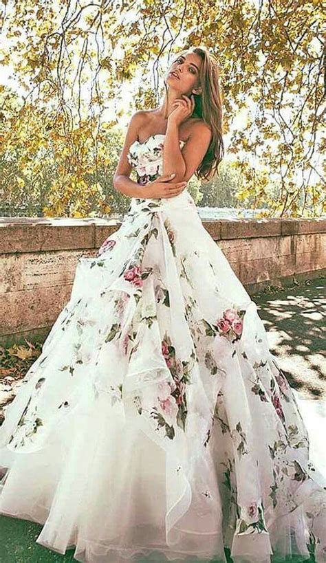 Floral wedding dresses are an incredibly feminine and romantic choice that look perfect at a spring or summer wedding. Pin by The Chic Technique on Formalities | Wedding dresses ...