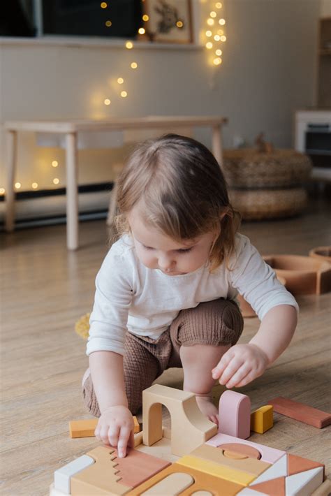 Photo Of Child Playing With Wooden Blocks · Free Stock Photo