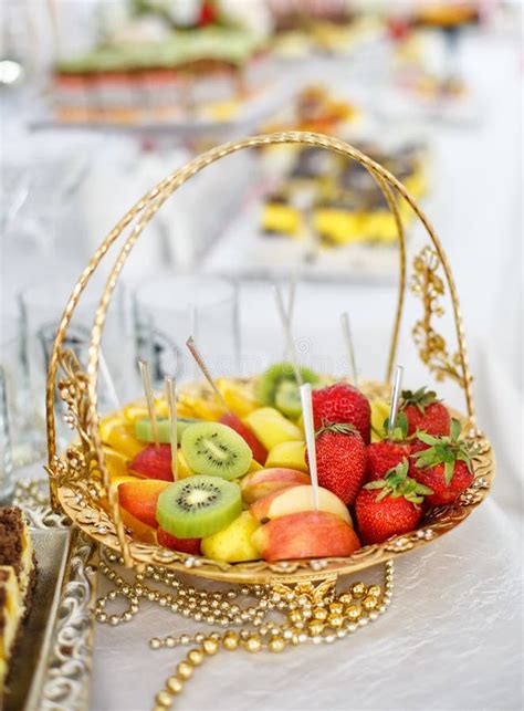 Decorated Catering Banquet Table With Different Food Snacks And Stuffed