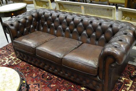 Check spelling or type a new query. Three seater brown leather chesterfield sofa, approx 204 ...