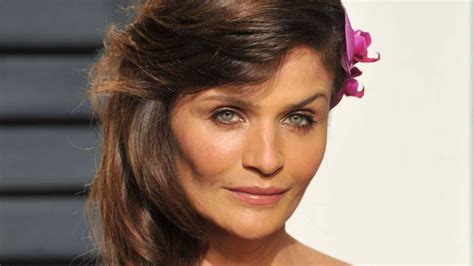 Helena Christensen Looks Unbelievably Youthful In Bold Swimsuit With