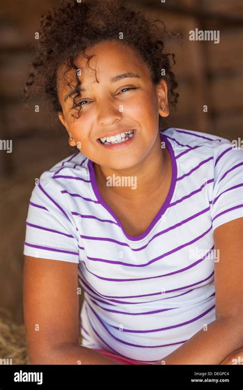 A Beautiful And Happy Mixed Race African American Female Girl Child