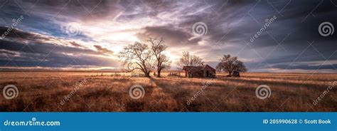 Old Farmhouse At Sunset In A Rural Setting Stock Photo Image Of