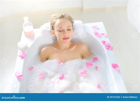Attractive Girl Relaxing In Bath On Light Background Royalty Free Stock Image Image 29161526