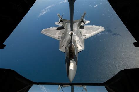 Asian Defence News F 22 Raptor Refueled By A Kc 10 Extender Over The