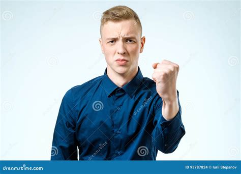 Young Man Angry Gesturing Fist Raised Stock Photo Image Of Blonde