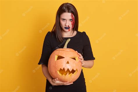 Free Photo Serious Girl With Angry Facial Expression Standing With