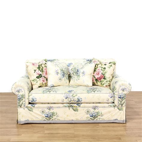 This Loveseat Is Upholstered In A Blue Floral Pattern This Cottage