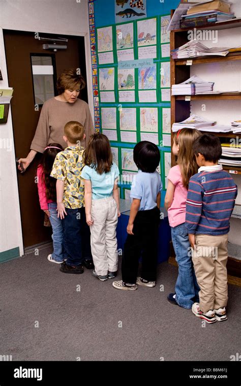 Children Line Up At Door Of Class Room Multi Ethnic Inter Racial