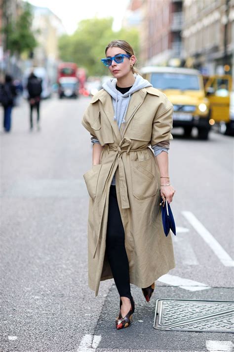17 forever trench coats to cherish this season and beyond trench coat outfit layering street