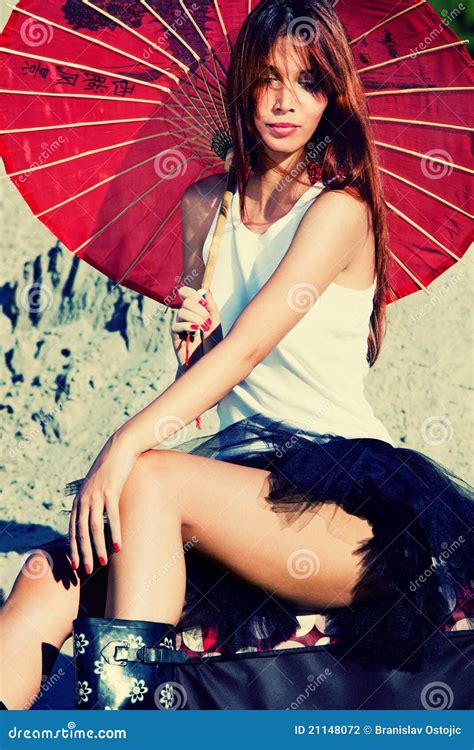 Woman With Parasol In 1950s Style Royalty Free Stock Image