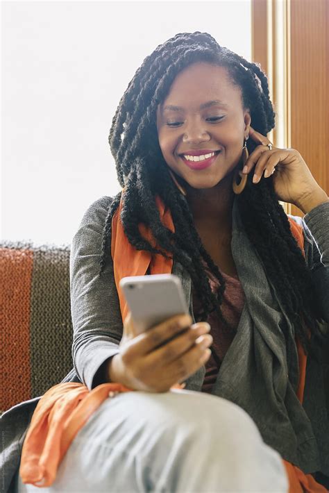 African American Woman On Cell Phone By Raymond Forbes Llc Mobile