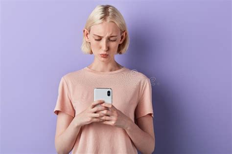 serious sad angry skeptical unhappy serious girl texting message stock image image of internet