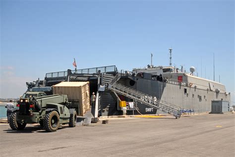 Fileus Navy 110503 N Aw868 125 Seabees Load A Storage Container Onto