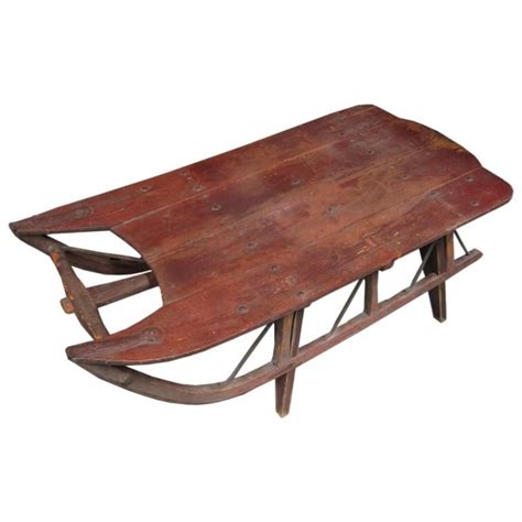 And when it comes to choosing a versatile style, an ottoman that can serve as a coffee table is a good option. antique sleds | Antique work sled converted to a coffee ...