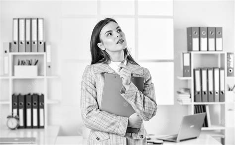 Premium Photo Elegant Woman With Document Folder Thinking Office Worker Formal Fashion Style
