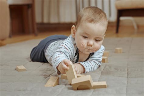 Cute Little Baby Boy Playing On The Floor Stock Photo Image Of Young