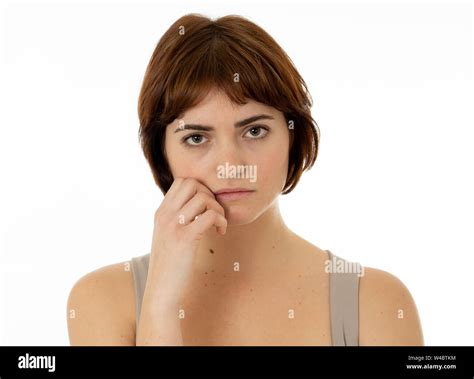Close Up Portrait Of Young Sad Woman Serious And Concerned Looking