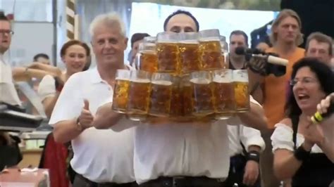 Oktoberfest Beer World Record Waiter Carries 27 Full Beer Mugs In Germany Hd Youtube