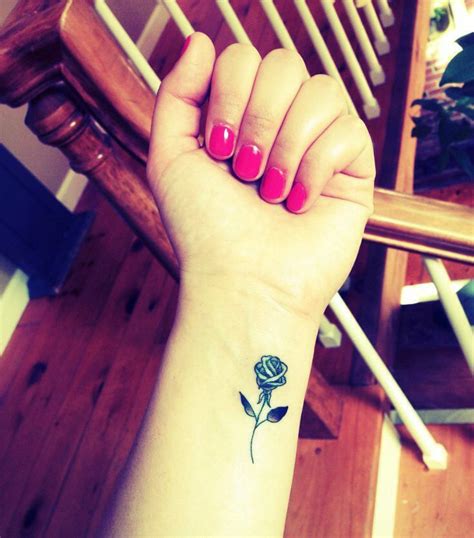 Love Roses Tattoo Ideas Wrist Tattoos Rose Tattoos For Women