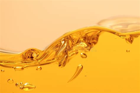 Yellow Bright Liquid With Splash And Stock Photo Image Of Bright