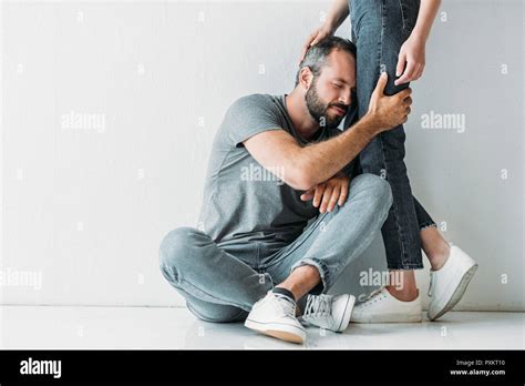 Hugging Legs Hi Res Stock Photography And Images Alamy