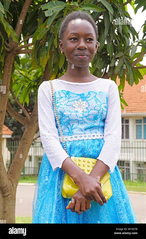 Young Teen Girl Dressed For A Sunday Wedding In Kampala Uganda Stock