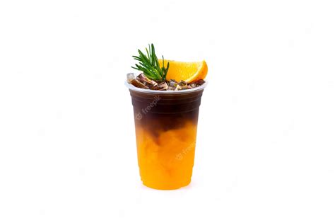 Premium Photo Iced Americano Black Coffee Mix Of Orange Juice