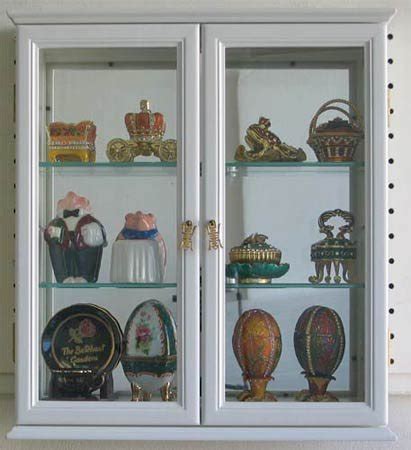 Stylish decorators will love hanging this curio cabinet on a wall that lacks decoration so their items can be visible. Small Wall Mounted Curio Cabinet / Wall Display Case with ...