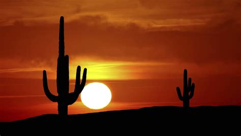 Time Lapse Colorful Sunset Clouds Swirl Across Arizona Desert