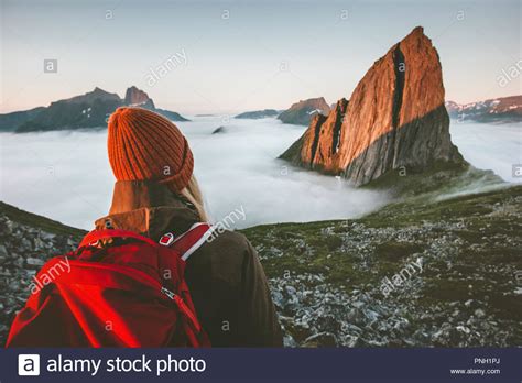 Woman Tourist With Backpack Enjoying View Adventure Outdoor In Norway