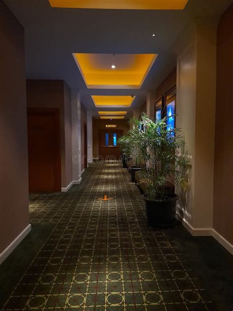 Hallway Of A Hotel Room With Dim Lights Stock Photo Image Of Floor