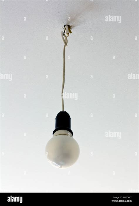 Light Bulb Hanging From The Ceiling On Wires Stock Photo Alamy