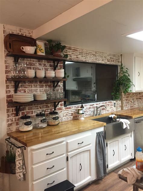 Farmhouse Kitchen With Faux Brick Backsplash Brick Kitchen Home Decor Kitchen Farmhouse