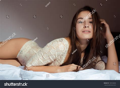 Pretty Brunette Woman Laying Bed Sensual Stock Photo