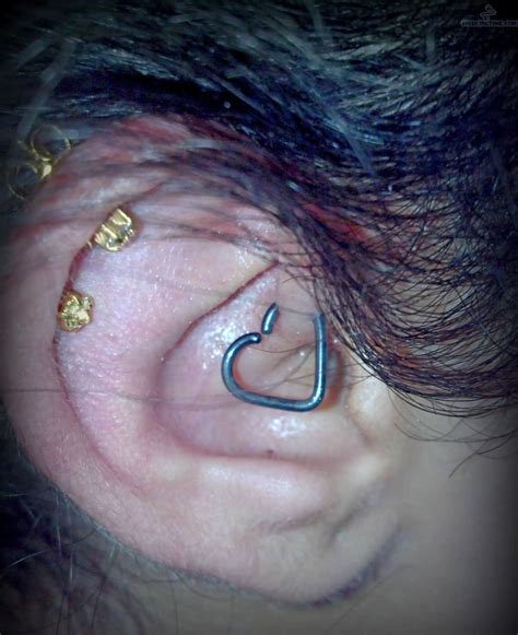 Ear Heart Piercing With Blue Heart Stud