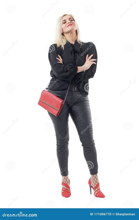 Self Assured Confident Cocky Mid Age Woman In Glamour Clothes Posing With Crossed Arms And Head