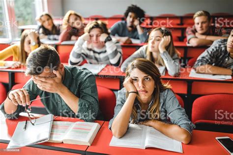Large Group Of Bored Students At Lecture Hall Stock Photo ...