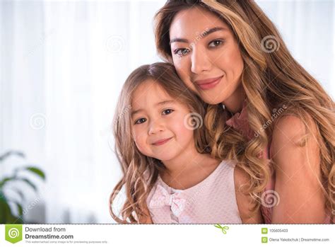 Cute Girl Enjoying Hug Of Her Mom Stock Image Image Of Female Cuddle 105605403