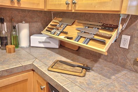 Pantries can benefit from extra storage and organization since their contents are often changing. Get the knife out. Under counter drop down knife storage ...