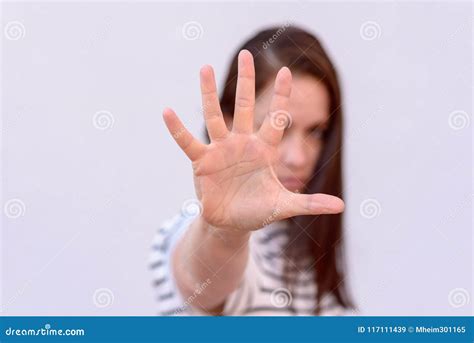 Young Woman With Hand In Front Of Face Stock Image Image Of Focus