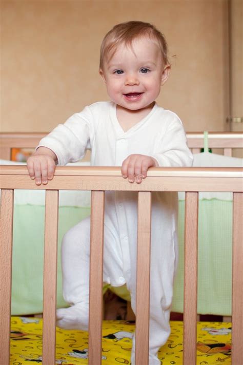 Baby In A Bed Stock Photo Image Of Happiness Active 9722414