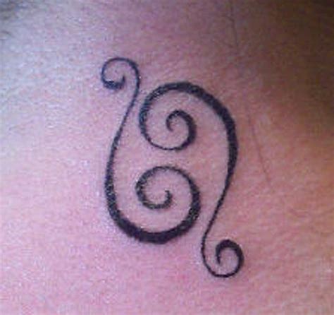 Download cancer zodiac tribal tattoo stock photos. 30+ Symbol Tattoos For Women